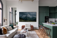 Alpine Solitude snow-capped mountain landscape displayed on Samsung Frame TV - 4K digital download featuring moody peaks in sage and eucalyptus green and gray palette