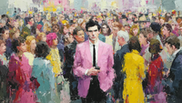 The Pink Suit cocktail party scene displayed on Samsung Frame TV - 4K digital download featuring man in pink suit checking phone amid crowd